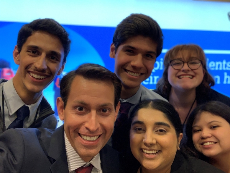 Youth Advisory Council panelists pose for a selfie with College Board's Edward Biedermann.